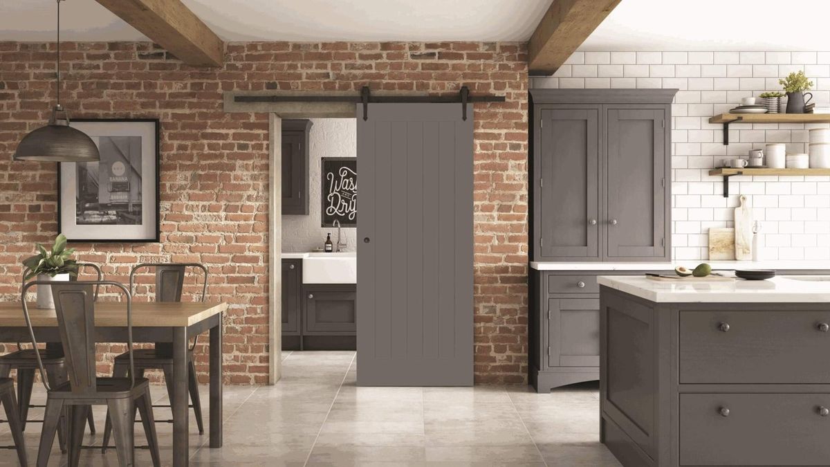 Porte coulissante en applique avec rail apparent