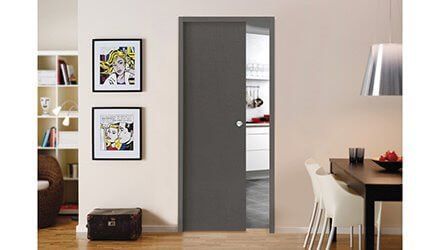 Porte coulissante à galandage – châssis intégré